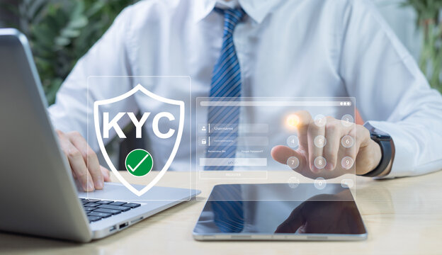 Businessman interacting with digital interface for KYC verification, identity authentication, personal data validation, and customer onboarding in fintech and identity verification technology.