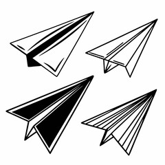Four paper airplanes in black and white origami flight