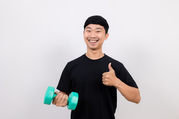positive asian man black shirt work out with dumbbell show thumb up isolated