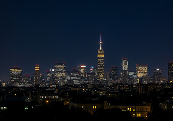 City Skyline Silhouette at Sunset with Lit Windows and Gradient Sky for Mobile Wallpaper