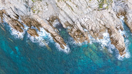Rocky coastline of Punta Caprara Bay on the island of Corsica