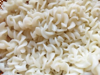 Pasta is a type of food made from dough, typically of wheat flour and water or eggs, formed into various shapes and then cooked by boiling or baking like noodles. Asian Food.