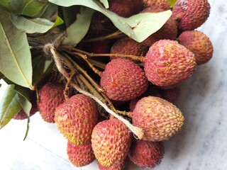 Litchi, also known as lychee or lichee, is a tropical fruit known for its sweet, aromatic flavor...