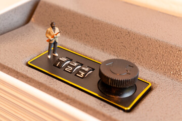 Miniature Thief Cracking Safe Lock Combination