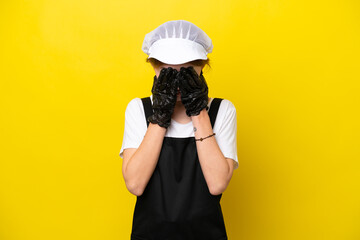 Young English fisherwoman isolated on yellow background with tired and sick expression