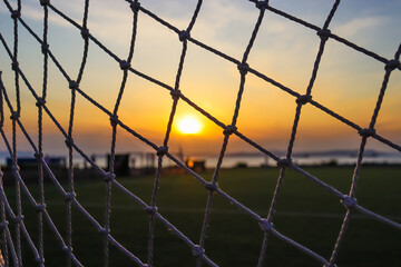 soccer goal at sunset