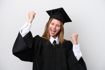 Young university graduate English woman isolated on white background celebrating a victory