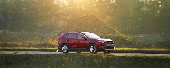Luxury SUV driving on scenic road