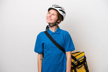 Young English woman with thermal backpack isolated on white background thinking an idea while looking up