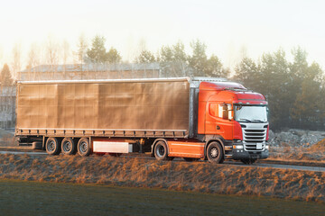Heavy vehicle transporting goods on highway