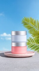 Pink and Silver Skincare Jars on Ceramic Plate with Palm Leaves