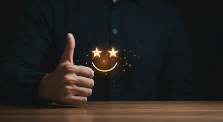 Man Gives a Thumbs Up for Positive Pixelated Smiley Face on a Wooden Table in Dark Setting