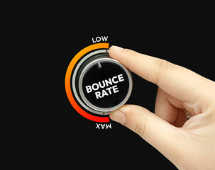 Low bounce rate on the website and app concept with knob turned by hand, backdrop