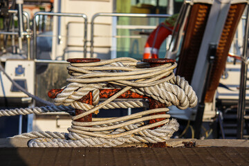 Bollard and ropes. Seaside vacation. Yachting. Sea travel.