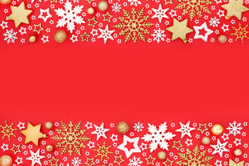 Xmas gold snowflake star bulb fantasy border on red background. Abstract festive ornate design for Yule, Christmas, Noel  season. Greeting card, gift tag. Copy space.