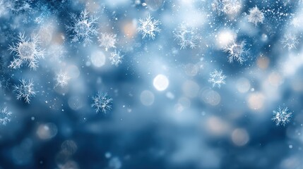 A serene winter background with soft snowflakes drifting in a gentle blue atmosphere, perfect for seasonal themes.