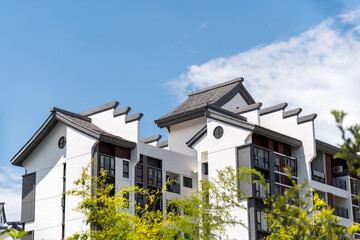 Modern apartment buildings with Chinese style rooftops
