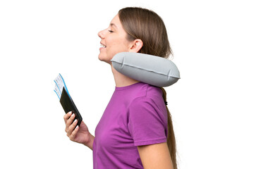 Young beautiful blonde woman with Inflatable travel Pillow over isolated background laughing in...