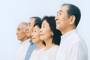 A group of elderly people, likely in a family or community setting, showing a sense of togetherness.