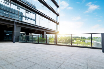 Empty brick road by the office building