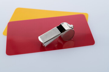 Football red and yellow cards on white background