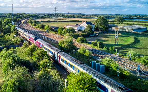 Aerial View of Train Crossing Bridge Over River in Long Eaton, UK

Drone Photo of Train on Railway Bridge Above River Trent, Long Eaton