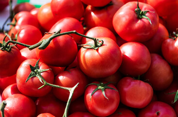 Pile of red tomatoes in market