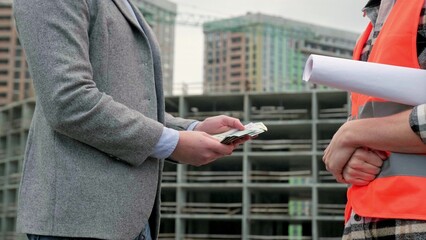 General contractor paying dollars to subcontractor for construction work