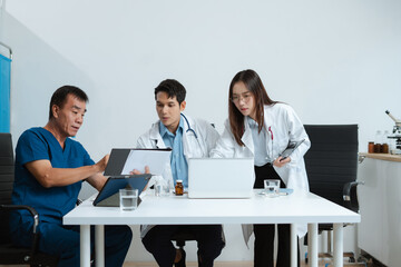 Medical team working on digital tablet healthcare doctor technology tablet using computer analyzed...