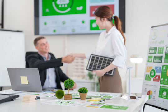 Global leaders collaborate on innovative green business strategies promoting corporate social responsibility and environmental sustainability goals reducing carbon footprint