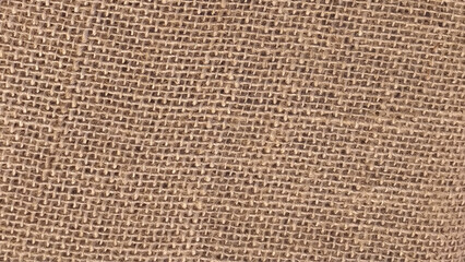 Close-up of fabric woven from burlap photo. Natural textured sacking burlap background. Hessian sack canvas woven texture
