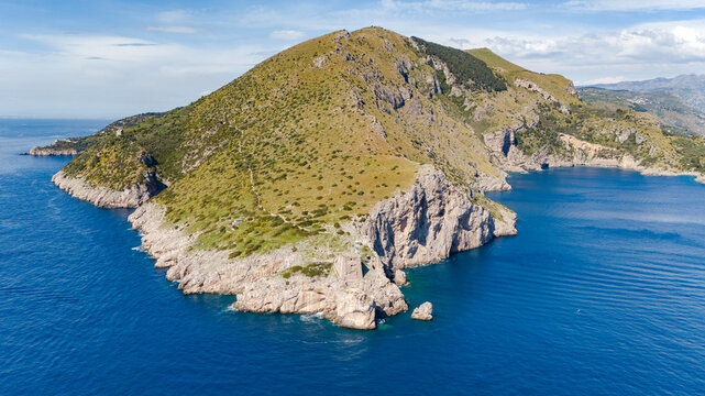 Aerial photo of Punta Campanella in Massa Lubrense, the extreme tip of the Sorrento Peninsula with the ancient Saracen tower. Amalfi Coast . Italy