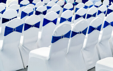 Many empty chairs in the conference room
