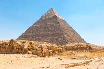 Beautiful majestic Egyptian pyramid of Khafre under the scorching sun of the Sahara desert. Cairo