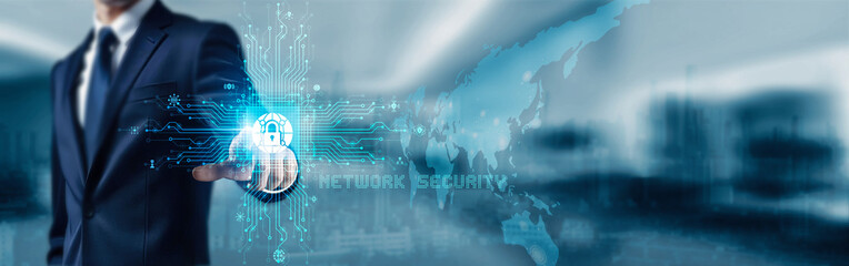 Businessman touching icon and word Network Security on a digital screen emphasizes protecting...