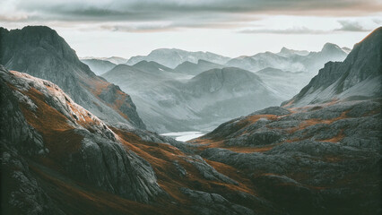 Majestic Mountain Range Vista Under a Cloudy Sky