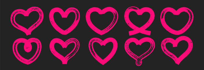 Set of hand drawn heart with brush or chalk texture. Grunge scribble elements in sketch style. Pink vector illustration on a black background.