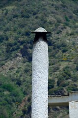 Traditional chimney of Capileira, Alpujarras of Granada, Andalusia, Spain.