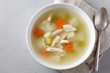 Aromatic chicken soup, comforting culinary hug for winter solstice, nourishing broth for soul-soothing gatherings, reminiscent of hygge embrace