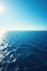 Tranquil Ocean Horizon Sunlight Dancing on Deep Blue Waves, Inspiring Serenity and Limitless Vastness. Perfect for travel, nature, and peaceful themes.