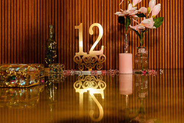 Table centerpiece with the number "12" at a Jewish woman's Bat Mitzvah celebration.