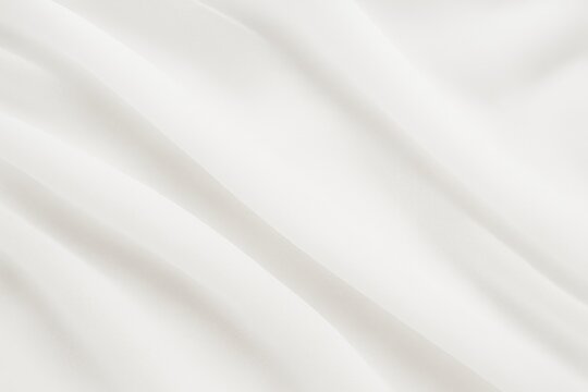 Elegant sheer design on a minimalist white veil with subtle textures