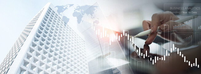 Business, finance and investment concept. Finance analyst using digital tablet analyzing and calculating financial data with economic graph growth chart, Business strategy and planning