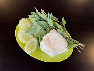 Fresh vegetables dishes served with Som Tam. Som tam or Thai green papaya salad