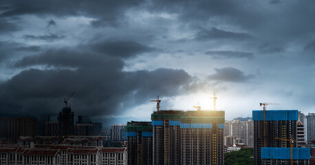 Dark stormy clouds over the city