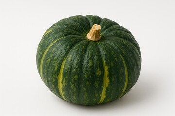 Detailed view of a vibrant green and yellow Japanese pumpkin on a plain white backdrop