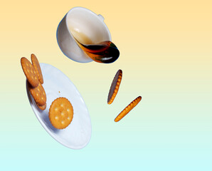 Coffee spilling from cup with crackers flying above plate on pastel background