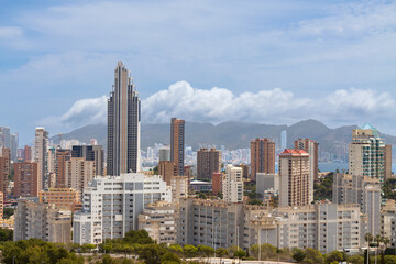 Modern skyline of Benidorm with mountains and sea