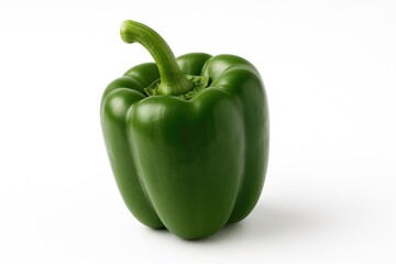 Fresh green capsicum displayed against a plain white backdrop