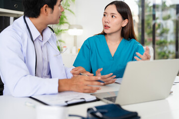 doctor and nurse is discussing and brainstorming on patient medical record after diagnosis for...